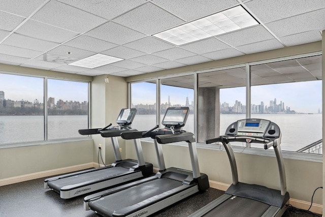 344 The Promenade Unit 344, Edgewater, NJ 07020 - exercise room featuring a view of city, baseboards, and plenty of natural light