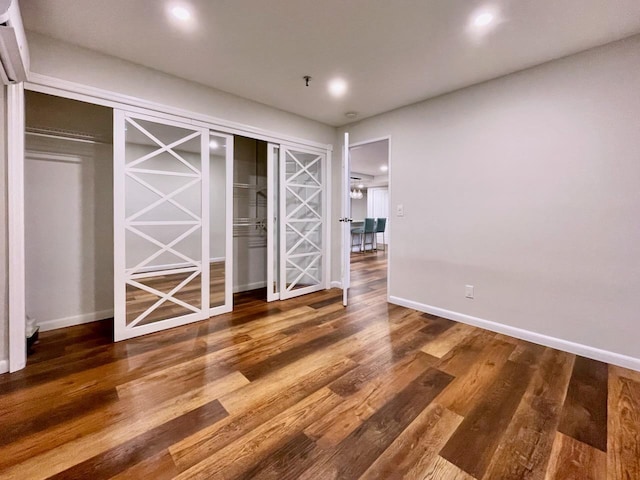 43 Van Wagenen Ave Unit Ga, Jersey City, NJ 07306 - unfurnished bedroom with wood finished floors and recessed lighting