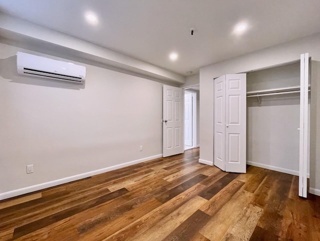 43 Van Wagenen Ave Unit Ga, Jersey City, NJ 07306 - unfurnished bedroom featuring a wall mounted air conditioner, wood finished floors, recessed lighting, and a closet