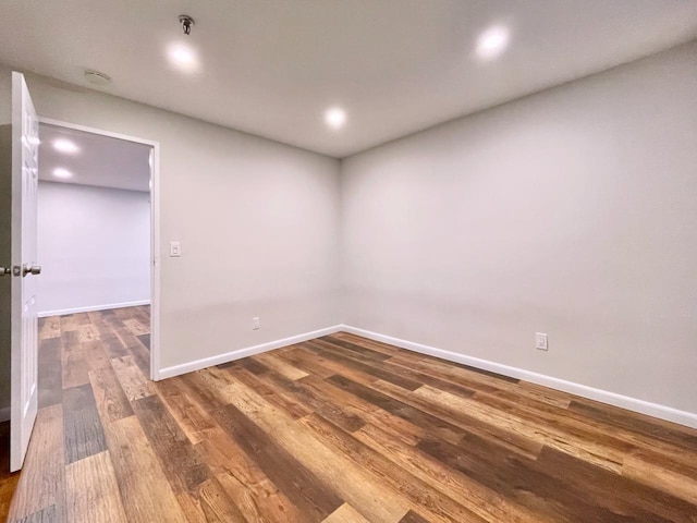 43 Van Wagenen Ave Unit Ga, Jersey City, NJ 07306 - spare room with dark wood finished floors, fire sprinkler in ceiling, recessed lighting, and a smoke detector
