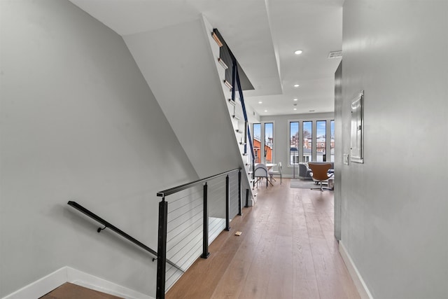 28 Cambridge Ave Unit 2, Jersey City, NJ 07307 - hall with an upstairs landing, visible vents, baseboards, recessed lighting, and wood-type flooring