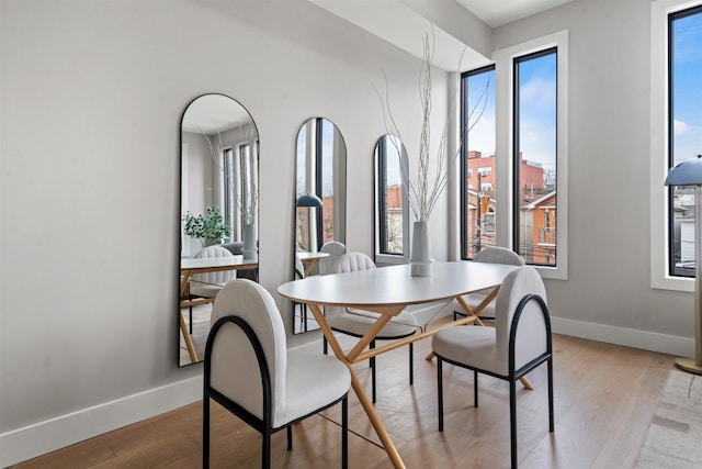 28 Cambridge Ave Unit 2, Jersey City, NJ 07307 - dining room with baseboards and light wood finished floors