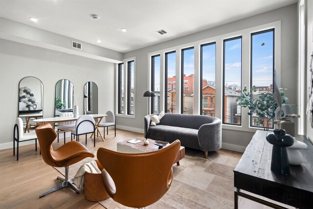 28 Cambridge Ave Unit 2, Jersey City, NJ 07307 - living room with baseboards, light wood-style flooring, and visible vents