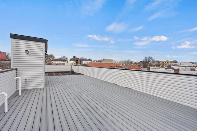28 Cambridge Ave Unit 2, Jersey City, NJ 07307 - wooden terrace with a city view