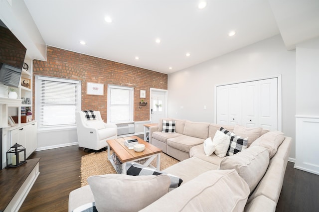 456 9th St Unit 458, Hoboken, NJ 07030 - living room featuring brick wall, dark wood-style flooring, and recessed lighting
