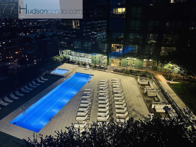 77 Hudson St Unit 1408, Jersey City, NJ 07302 - community pool with a patio