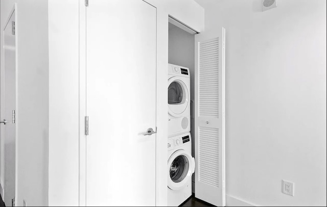 77 Hudson St Unit 1408, Jersey City, NJ 07302 - laundry room with stacked washer / dryer, laundry area, and visible vents