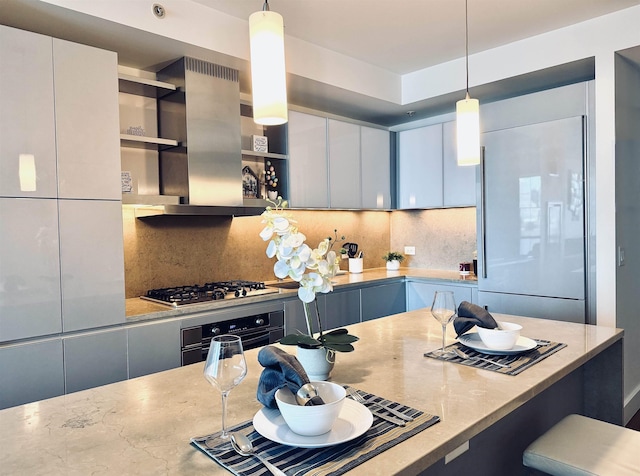 77 Hudson St Unit 1408, Jersey City, NJ 07302 - kitchen featuring tasteful backsplash, island range hood, oven, and stainless steel gas cooktop