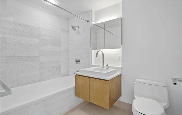 77 Hudson St Unit 1408, Jersey City, NJ 07302 - full bath with tile patterned flooring, toilet, vanity, and tiled shower / bath