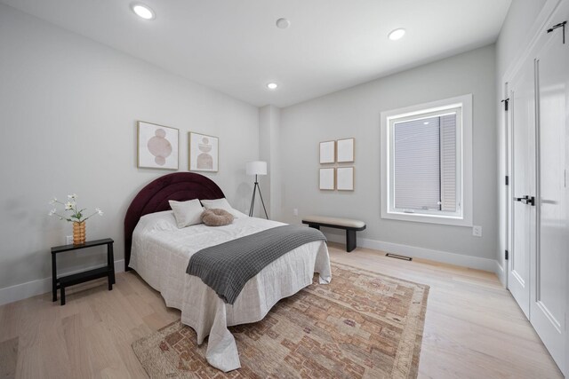 45 Graham St Unit 1, Jersey City, NJ 07307 - bedroom with light wood-style floors and recessed lighting