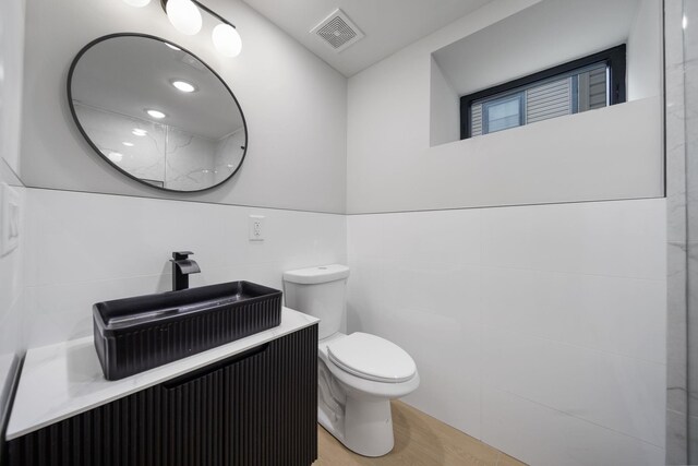 45 Graham St Unit 1, Jersey City, NJ 07307 - bathroom featuring vanity and wood finished floors