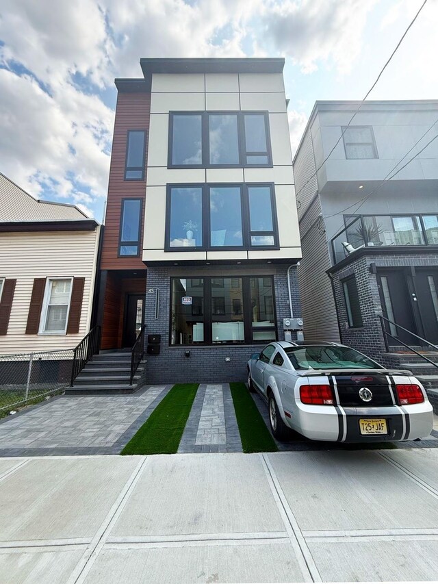 45 Graham St Unit 1, Jersey City, NJ 07307 - back of house featuring brick siding