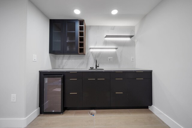 45 Graham St Unit 1, Jersey City, NJ 07307 - indoor bar featuring beverage cooler, backsplash, and recessed lighting