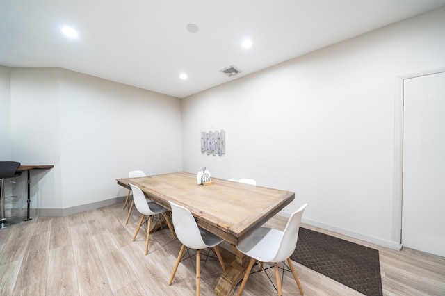 dining space featuring light hardwood / wood-style floors