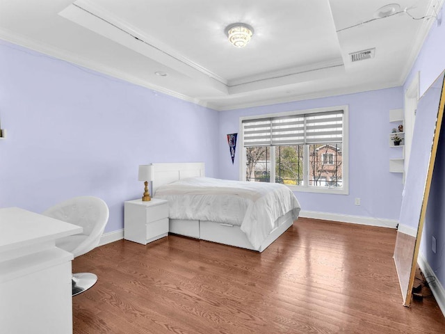 183 Oak Ave, River Edge, NJ 07661 - bedroom with a tray ceiling, ornamental molding, wood finished floors, and baseboards