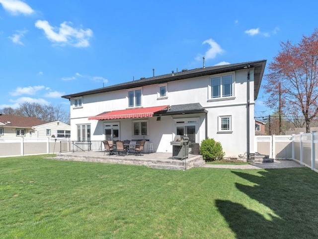 183 Oak Ave, River Edge, NJ 07661 - back of property featuring stucco siding and a patio