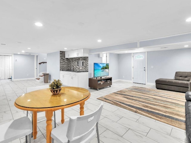 183 Oak Ave, River Edge, NJ 07661 - living area featuring light marble finish floors, recessed lighting, and baseboards