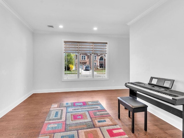 183 Oak Ave, River Edge, NJ 07661 - living area featuring crown molding, wood finished floors, recessed lighting, and baseboards