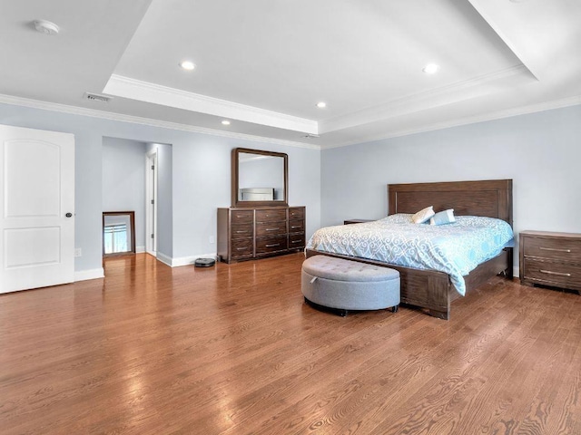 183 Oak Ave, River Edge, NJ 07661 - bedroom with a raised ceiling, wood finished floors, crown molding, recessed lighting, and baseboards