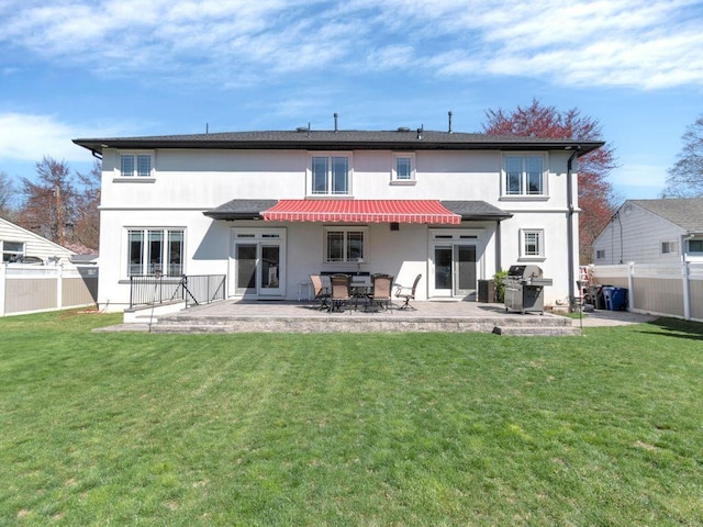 183 Oak Ave, River Edge, NJ 07661 - rear view of property with stucco siding and a patio area