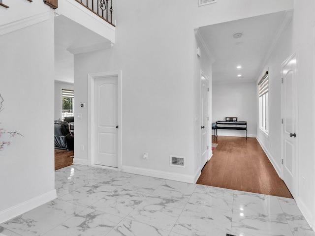 183 Oak Ave, River Edge, NJ 07661 - corridor featuring marble look tile flooring, baseboards, crown molding, and recessed lighting