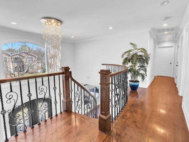 183 Oak Ave, River Edge, NJ 07661 - hall featuring an upstairs landing, wood finished floors, a chandelier, recessed lighting, and baseboards