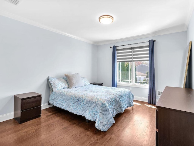 183 Oak Ave, River Edge, NJ 07661 - bedroom with baseboards, ornamental molding, and wood finished floors