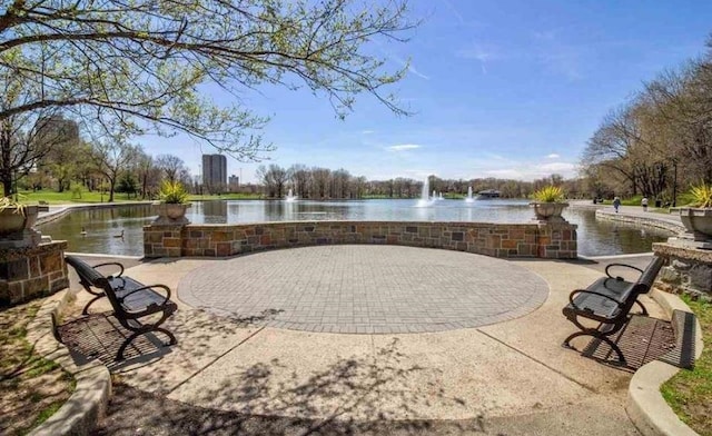 view of patio / terrace featuring a water view