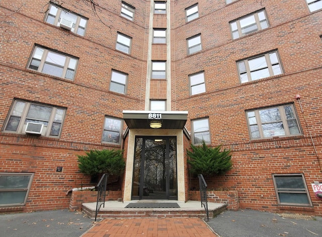 view of building exterior featuring cooling unit