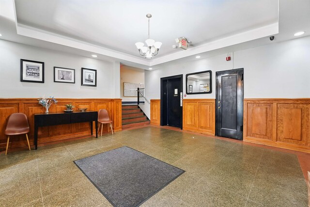 2520 Kennedy Blvd Unit 4J, Jersey City, NJ 07304 - welcome area with recessed lighting, wainscoting, a chandelier, stairs, and a security system