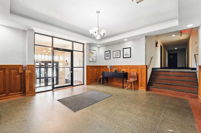 2520 Kennedy Blvd Unit 4J, Jersey City, NJ 07304 - building lobby with wainscoting, stairway, and recessed lighting