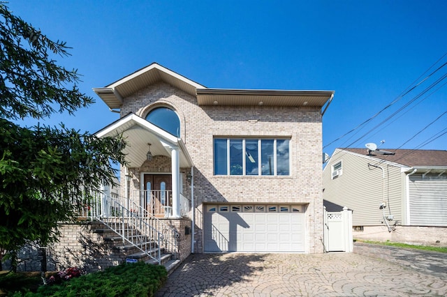 view of front of property with a garage