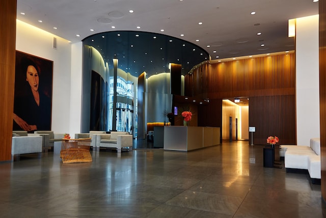 77 Hudson St Unit 1712, Jersey City, NJ 07302 - reception area with a towering ceiling and recessed lighting