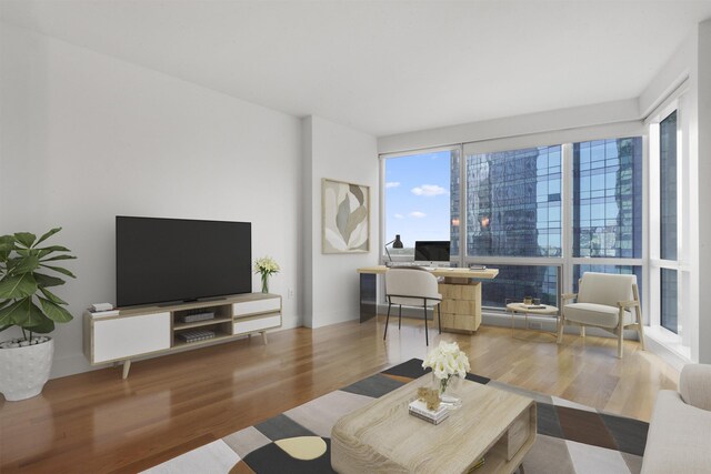 77 Hudson St Unit 1712, Jersey City, NJ 07302 - living area featuring wood finished floors
