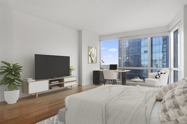 77 Hudson St Unit 1712, Jersey City, NJ 07302 - bedroom with wood finished floors