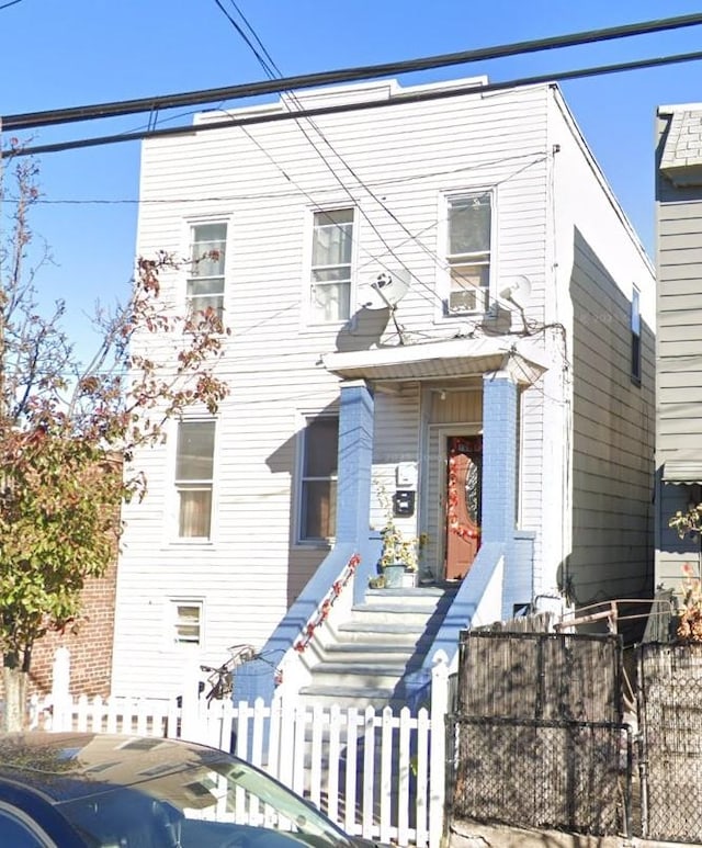 702 8th St, Union City, NJ 07087 - view of property featuring a fenced front yard