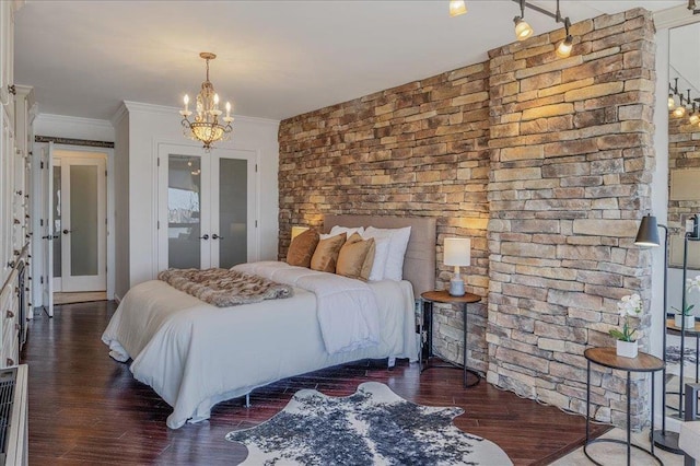 380 Mountain Rd Unit 808, Union City, NJ 07087 - bedroom featuring wood finished floors, a chandelier, crown molding, and french doors