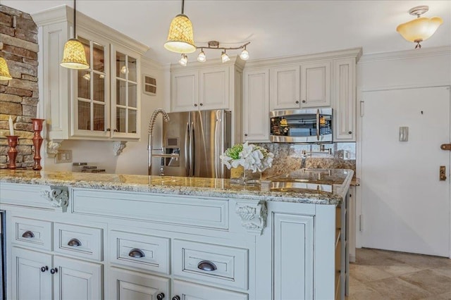 380 Mountain Rd Unit 808, Union City, NJ 07087 - kitchen featuring stainless steel appliances, glass insert cabinets, light stone counters, a peninsula, and pendant lighting