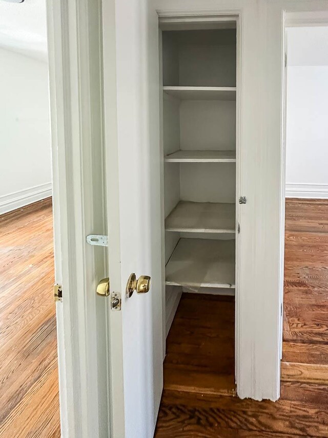 36 Duncan Ave Unit D2, Jersey City, NJ 07304 - bedroom with wood finished floors and a textured ceiling
