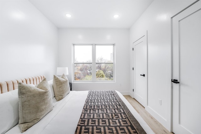 bedroom featuring light wood-type flooring