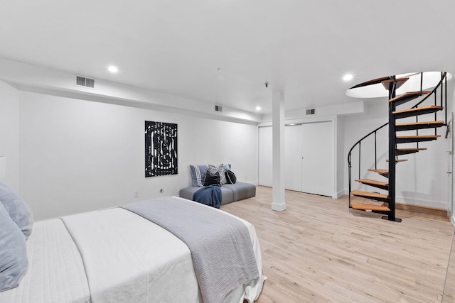 bedroom featuring light hardwood / wood-style flooring