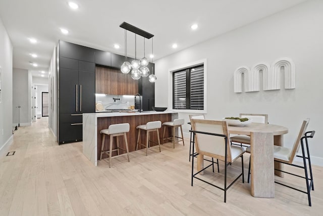 dining area featuring light hardwood / wood-style floors