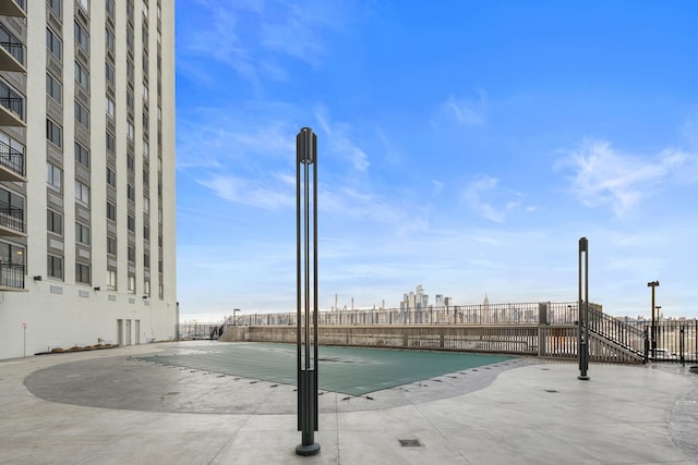 view of pool with fence