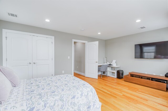 347 Forest St, Kearny, NJ 07032 - bedroom featuring wood finished floors, recessed lighting, a closet, and baseboards