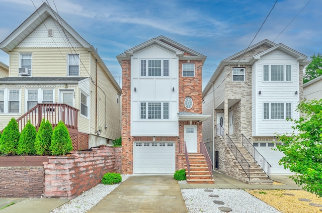 347 Forest St, Kearny, NJ 07032 - view of front of property with a garage, driveway, and brick siding