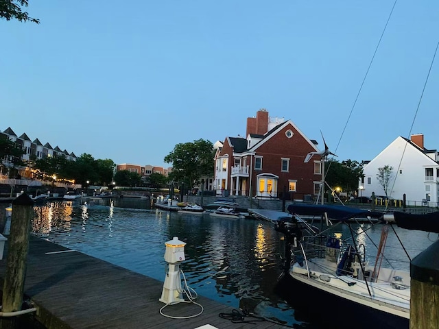 30 Freedom Way Unit 306, Jersey City, NJ 07305 - water view with a dock and nearby suburban area