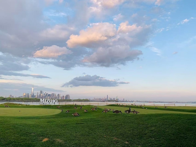 30 Freedom Way Unit 306, Jersey City, NJ 07305 - view of property's community featuring a water view, a lawn, an area to practice putting, and view of golf course