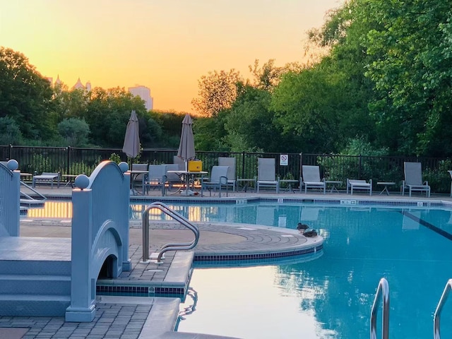 30 Freedom Way Unit 306, Jersey City, NJ 07305 - community pool featuring a patio and view of scattered trees