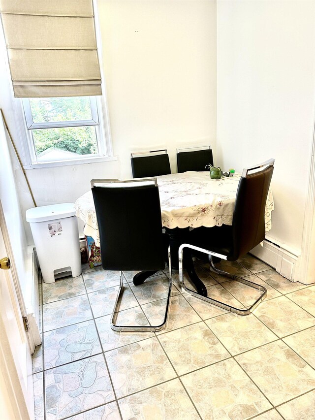 306 Columbia Ave, Jersey City, NJ 07307 - dining area with a baseboard heating unit