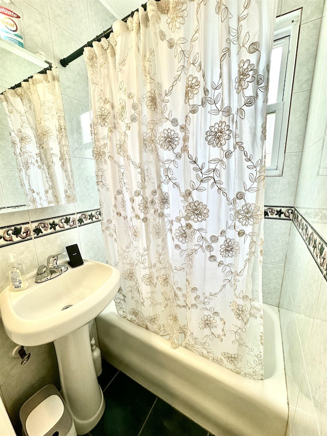306 Columbia Ave, Jersey City, NJ 07307 - full bath featuring tile walls, shower / tub combo with curtain, tile patterned floors, and backsplash